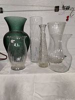 All six vases grouped on table
