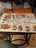 All key rings laid out on laptop for quantity overview