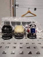 Front view of three McDonald's NHL mini helmets showing player names Evgeni Malkin, Alexander Ovechkin, Carey Price
