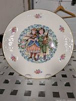 Front view of Royal Doulton Valentine plate showing design and condition