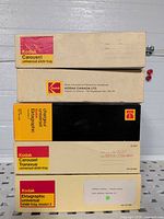 Front view of five Kodak slide tray boxes stacked