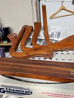 Curved arms and straight slats displayed together