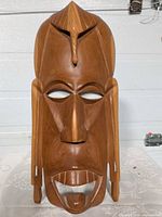 Front view of carved wooden mask