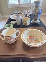 Mug and bowl Bunnykins set on table