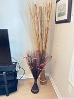 Both floor arrangements beside TV stand