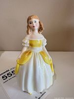 Front view of Penny figurine