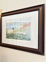 Front view of framed print on wall