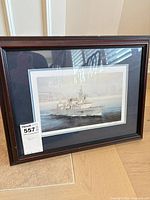 Full view of framed painting with mat and frame