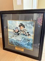 Full view of framed print with plaque visible