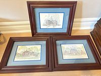 All three framed prints displayed side by side