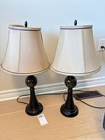 Front view of both matching lamps showing bases and shades