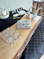 Overview of board, shakers, coaster pack and napkin rings