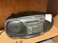 Front view of Emerson boombox showing speakers, control panel and wear