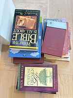 Stack of six religious books top view