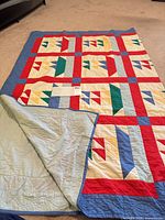 full view showing front design and partial reverse