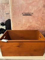 Overall view of open wooden box