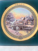 Front view of plate in presentation box