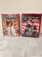 Front view showing both sealed combo movies
