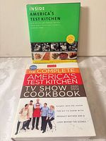 Front covers of both cookbooks together