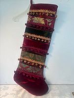 Front view of velvet and brocade stocking with gold trim