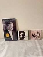 Group showing Tony Bennett box, Gordon Lightfoot CD, Fleetwood Mac CD