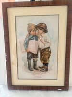 Framed colour lithograph of two boys, full view