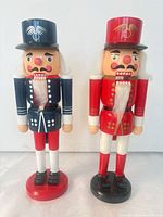 Front view of both wooden nutcrackers showing colors and condition