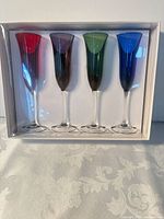 Boxed set of four colored champagne flutes