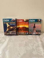 Front view of three Rick Steves Europe DVD box sets