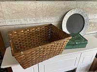 Overall view of basket, tin and tray