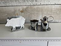 Pig napkin holder, stainless steel cream and sugar set on tray