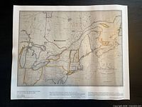 Full view of unframed map poster on tabletop