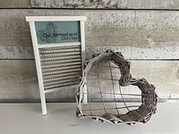 Front view of both items showing washboard design and basket shape