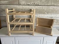 Front view of wine rack and box on surface