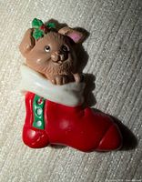 Front view of Russ stocking pin