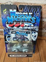 Front view of sealed Muscle Machines ’41 Willys Coupe blister pack