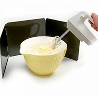 Guard in use around mixing bowl with hand mixer