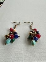 Front view of the pair showing bead colours and cluster design