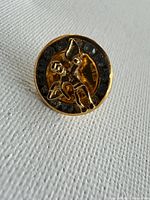 front view showing angel motif and stone border