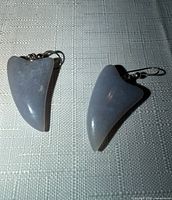Front view of both stone earrings showing shape and color