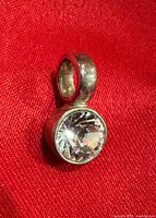 Front view of pendant showing stone and bezel