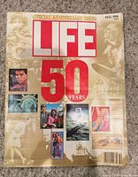 Front cover displaying LIFE masthead, 50 Years text, assorted images