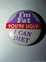 Front view showing full slogan and colors