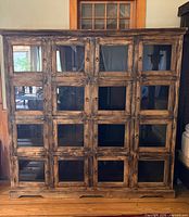 Full view of 16-cubby wood cabinet