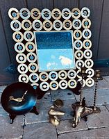 Group shot showing mirror, bowl, brass items