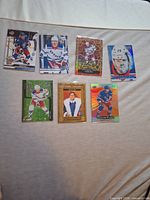 Group shot of seven Adam Fox New York Rangers trading cards