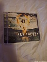 Front cover of Rev Theory Light It Up CD in jewel case