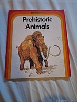 Front cover showing title and mammoth illustration