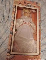 Front view of boxed Prince Doll Collection doll showing outfit and packaging