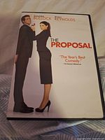 Front cover of The Proposal DVD case showing title and stars